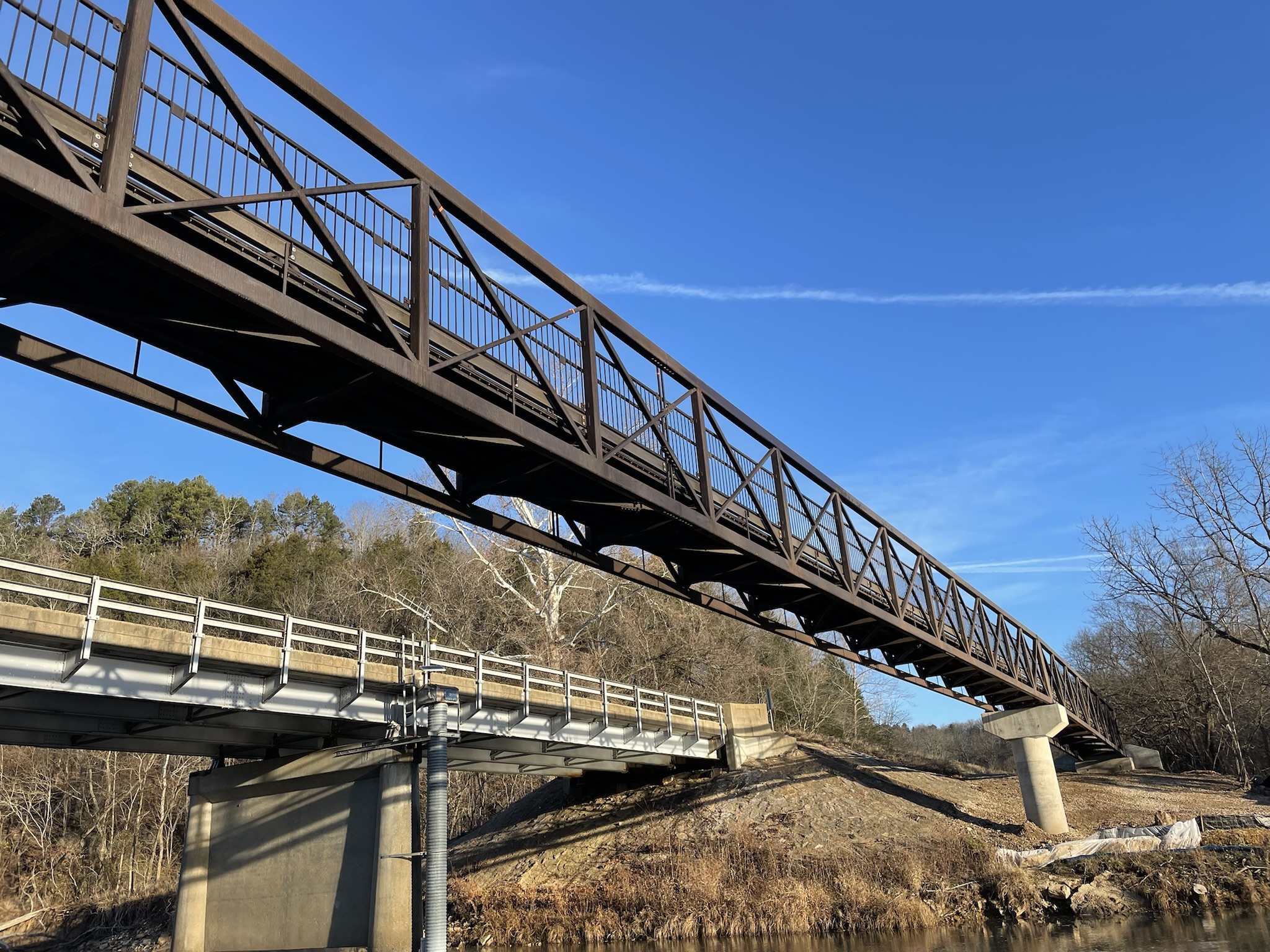 How natural color helps galvanized steel bridges blend in scenic river corridors